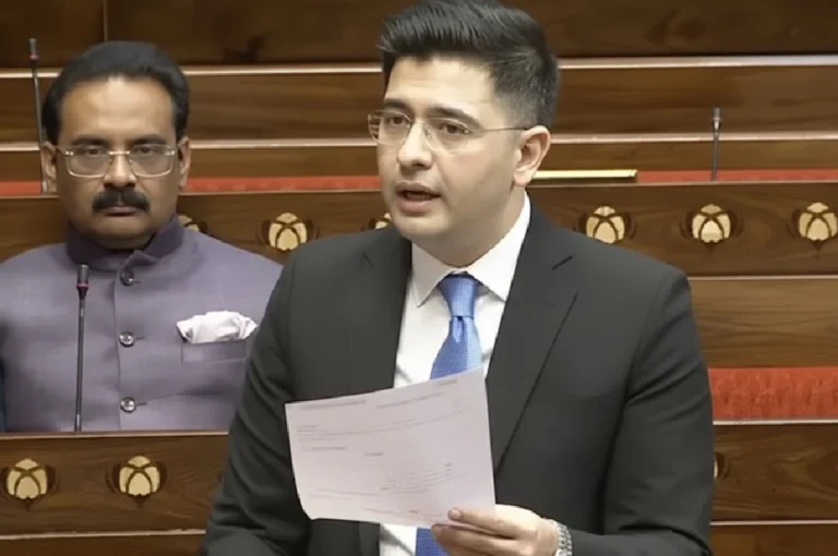 রাঘব চাড্ডা: সংসদের মঞ্চে তরুণ কণ্ঠের ঝড় │ কেন বাড়ছে তাঁর জনপ্রিয়তা? Raghav Chadha speaking in Parliament, holding a document and addressing members during a debate session.