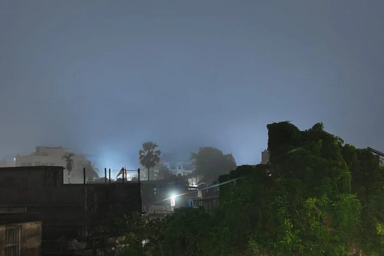 Blue haze covering Kolkata night sky due to air pollution and humidity
