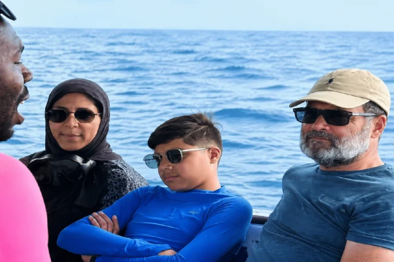 রাহুল গান্ধীর নৌকাভ্রমণের ছবি ঘিরে তোলপাড়, সঙ্গে থাকা মহিলা ও শিশুর পরিচয় কী? Rahul Gandhi Boat Photo showing Rahul Gandhi sitting on a boat with a woman and child during a family vacation