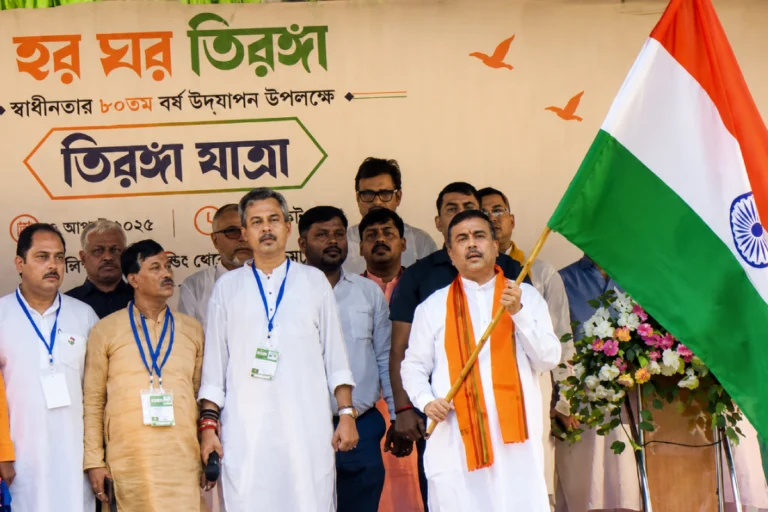 রাজপথ ভরল জাতীয় পতাকায়! কী বার্তা দিলেন শুভেন্দু অধিকারী Har Ghar Tiranga Rally led by Shuvendu Adhikari with supporters carrying the Indian national flag during a patriotic march in West Bengal.