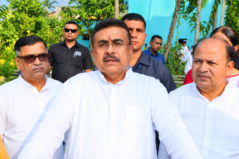 চোরবাগান কাণ্ডে বাংলাদেশের ফেক ন্যারেটিভ লাইক শেয়ারে জামিন অযোগ্য ধারায় মামলা—জানালেন শুভেন্দু অধিকারী Suvendu Adhikari Chorbagan Stampede – Suvendu Adhikari speaking to the media outdoors, surrounded by colleagues and security personnel, during coverage of the Chorbagan tragedy.